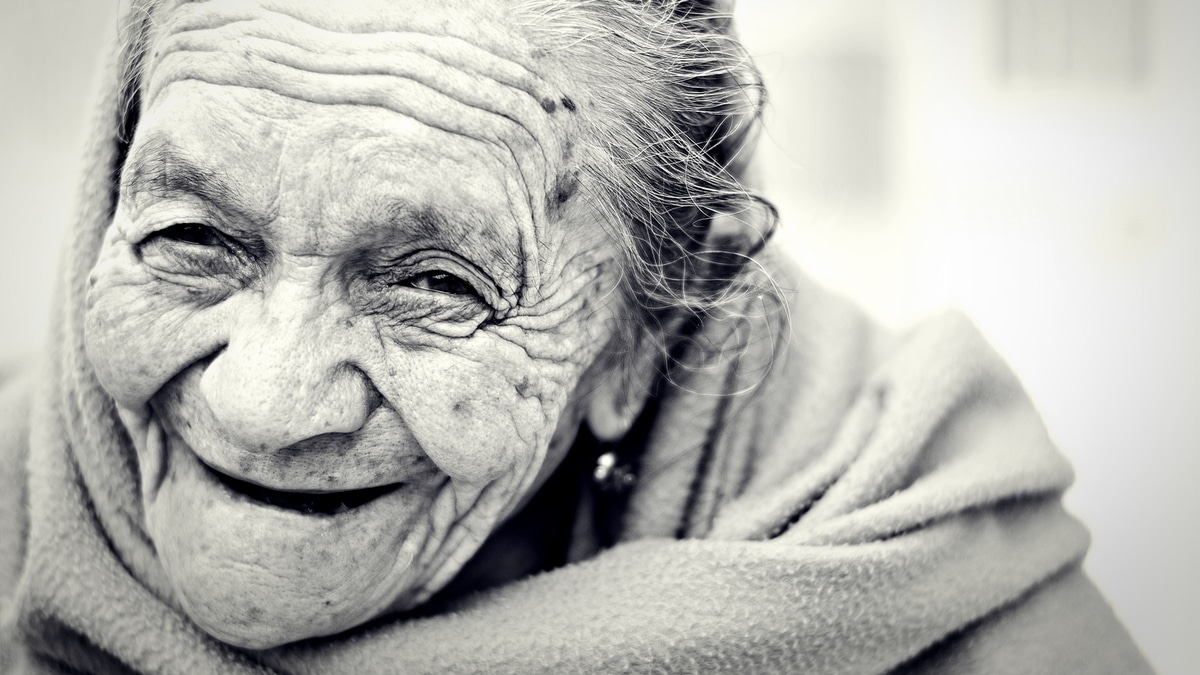 Older woman smiles